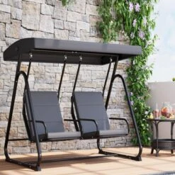 2-Person Patio Swing Chair With Adjustable Canopy & Removable Cushions 16 2-Person Patio Swing Chair With Adjustable Canopy & Removable Cushions -House Beautiful GUEST 4aa47109 f501 4dd9 a630 1035a06ec974