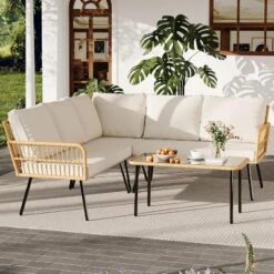 4 Pieces Outdoor Patio Furniture Set, All-Weather Wicker Rattan Sectional L-Shaped Set With Glass Top Coffee Table & Cushioned Chairs 14 4 Pieces Outdoor Patio Furniture Set, All-Weather Wicker Rattan Sectional L-Shaped Set With Glass Top Coffee Table & Cushioned Chairs -House Beautiful GUEST 7cacf74c 09a7 4aea 97ac fbeb7adda925