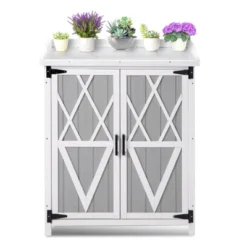Outdoor Cabinet With Metal Tabletop Garden Potting Bench Table 15 Outdoor Cabinet With Metal Tabletop Garden Potting Bench Table -House Beautiful GUEST d960488f 4770 4e30 a40d 74374e63b165